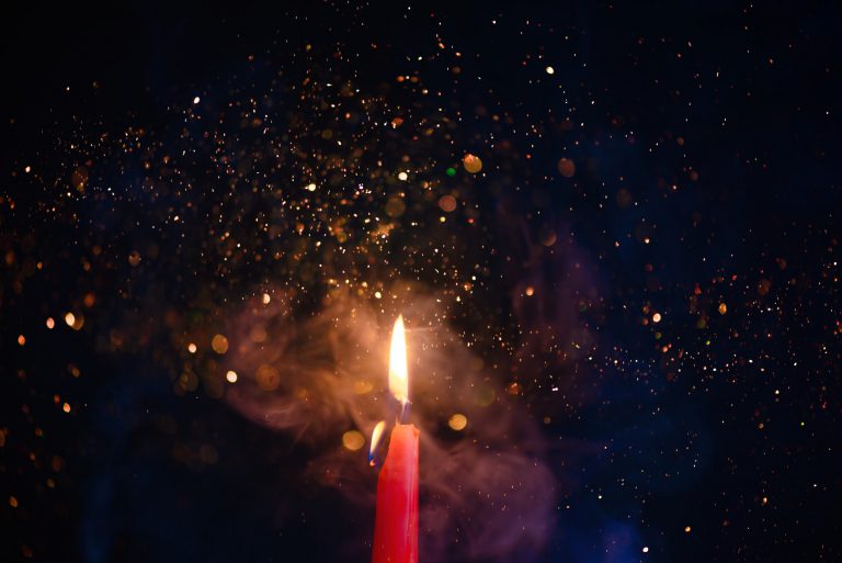 Flame and smoke texture with sparkles. Candle fire on a black background with gradient blue and